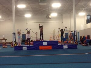 Gymnastics athletes participate in a showcase event at AIM Gymnastics in Ajax and Pickering, Ontario.